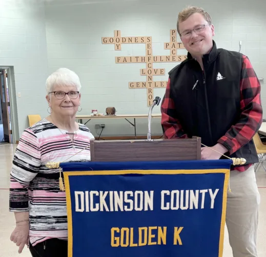 Golden K hears history of Bay Cliff Health Camp